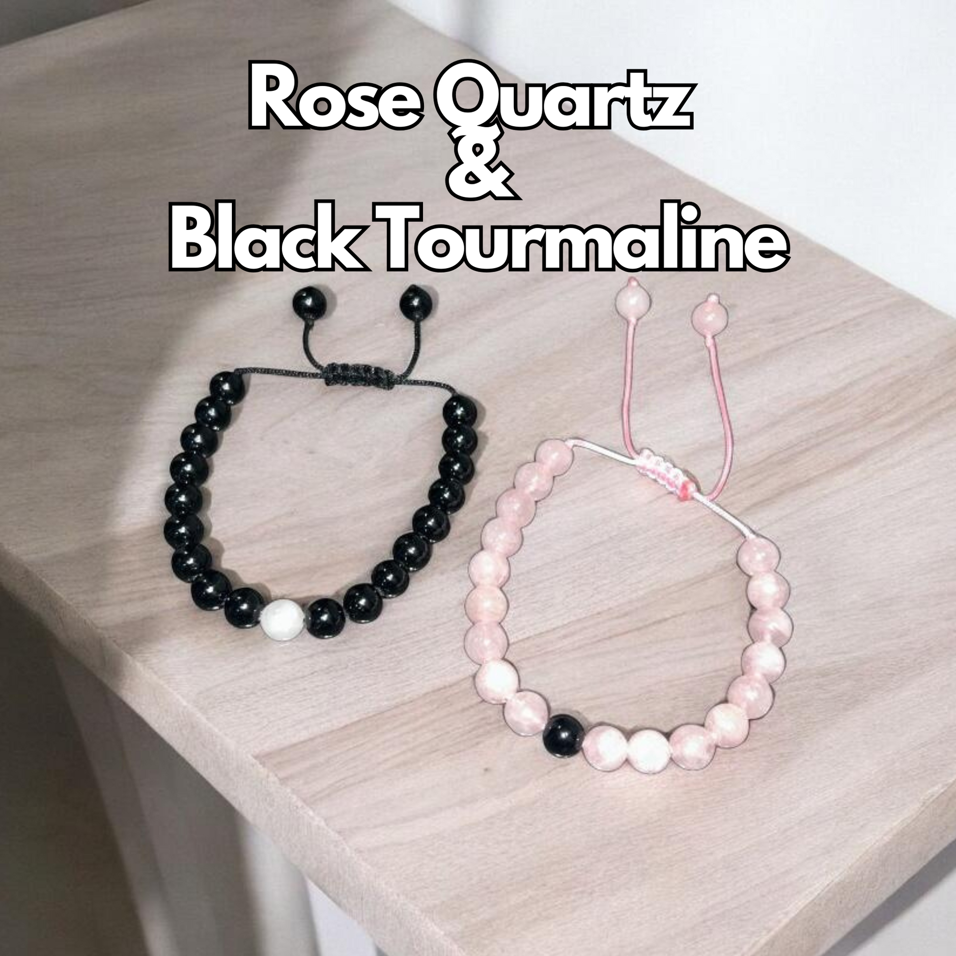 Two couple bracelets, one with pink rose quartz beads and the other with black tourmaline beads, Displayed on a wooden surface
