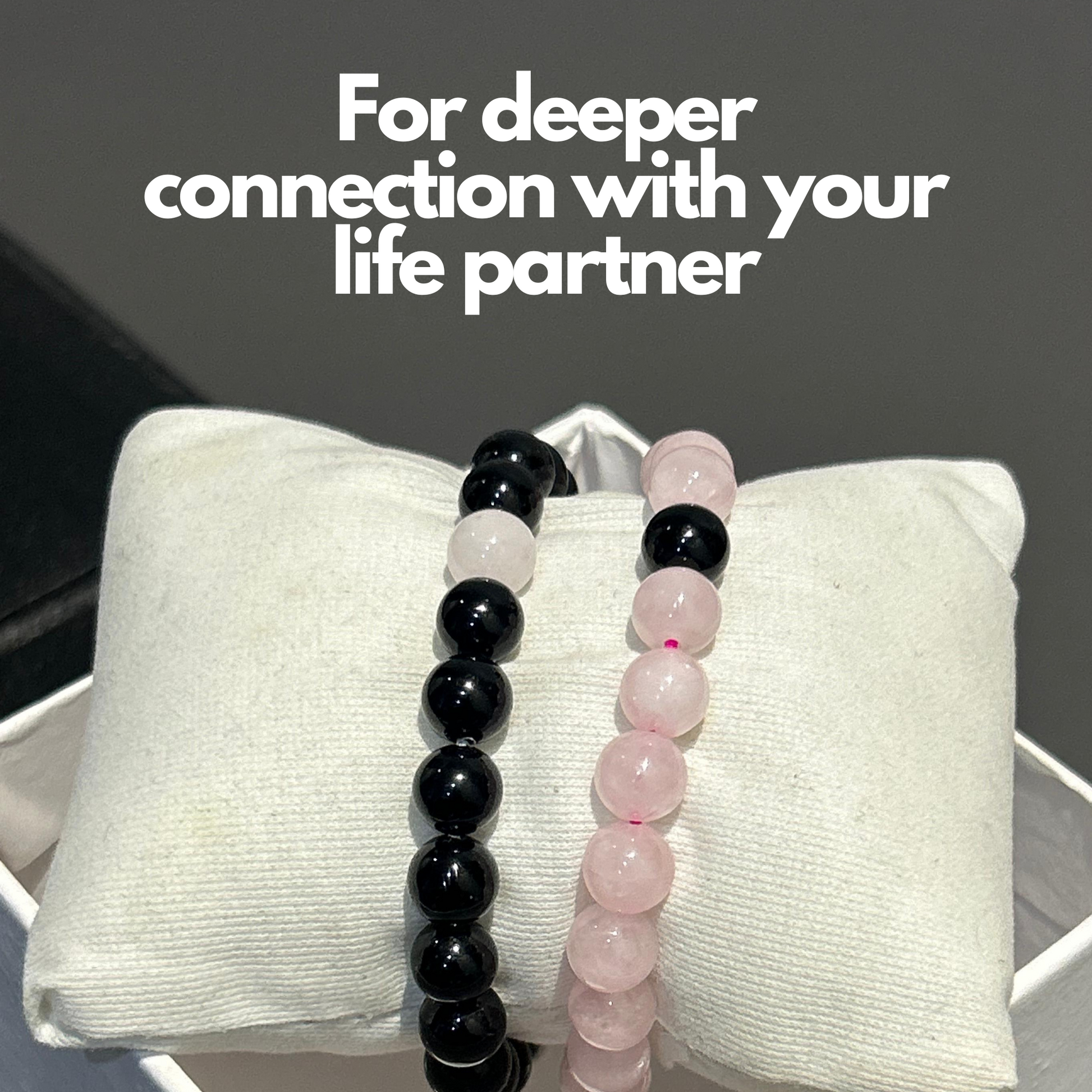 Two beaded bracelets, one with pink rose quartz and the other with black tourmaline