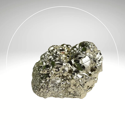 A raw Pyrite stone cluster with a metallic cluster, predominantly in shades of gray and gold, against a white background. Known for Attracting Wealth and Abundance. Place it in the North-East Corner.